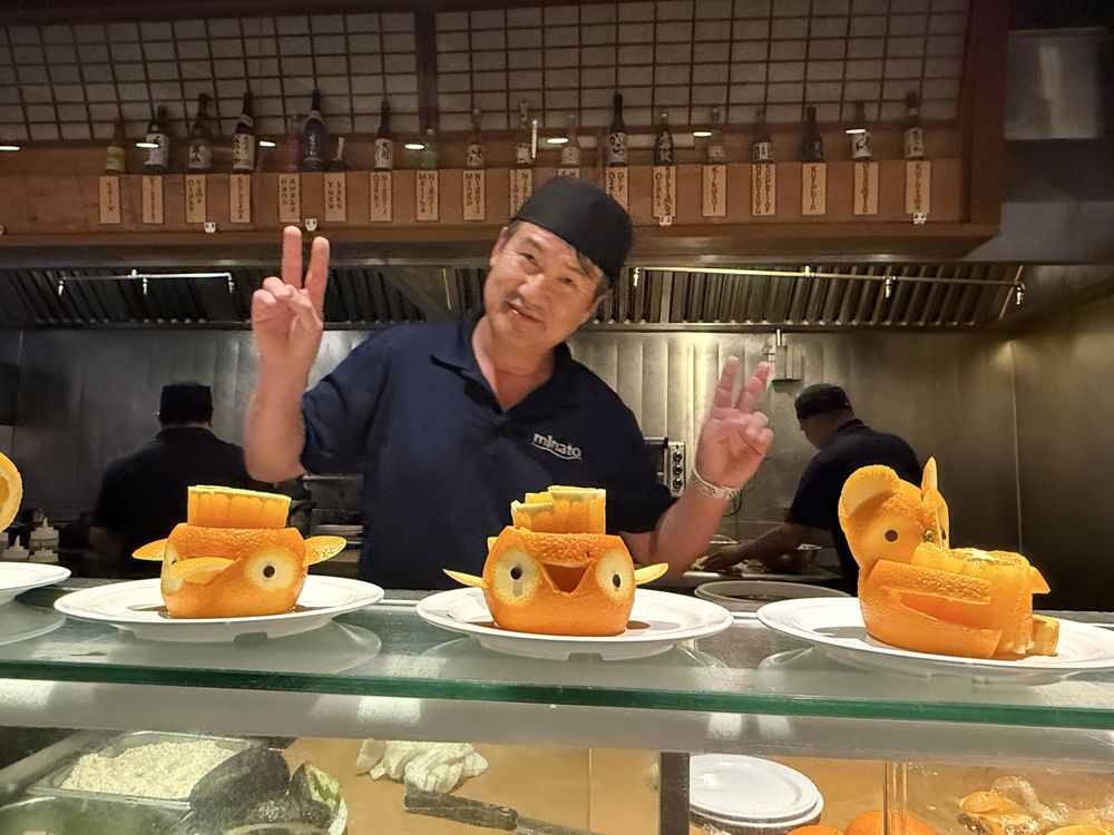 A Minato Sushi regular enjoying a meal at the restaurant