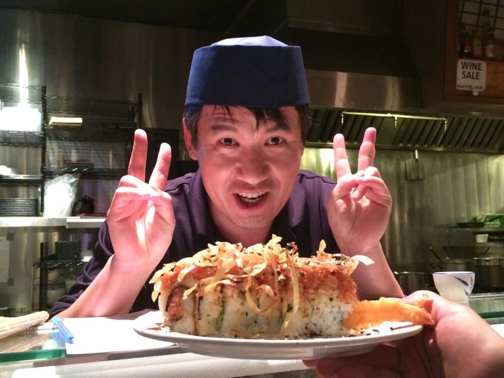 A Minato Sushi regular enjoying a meal at the restaurant