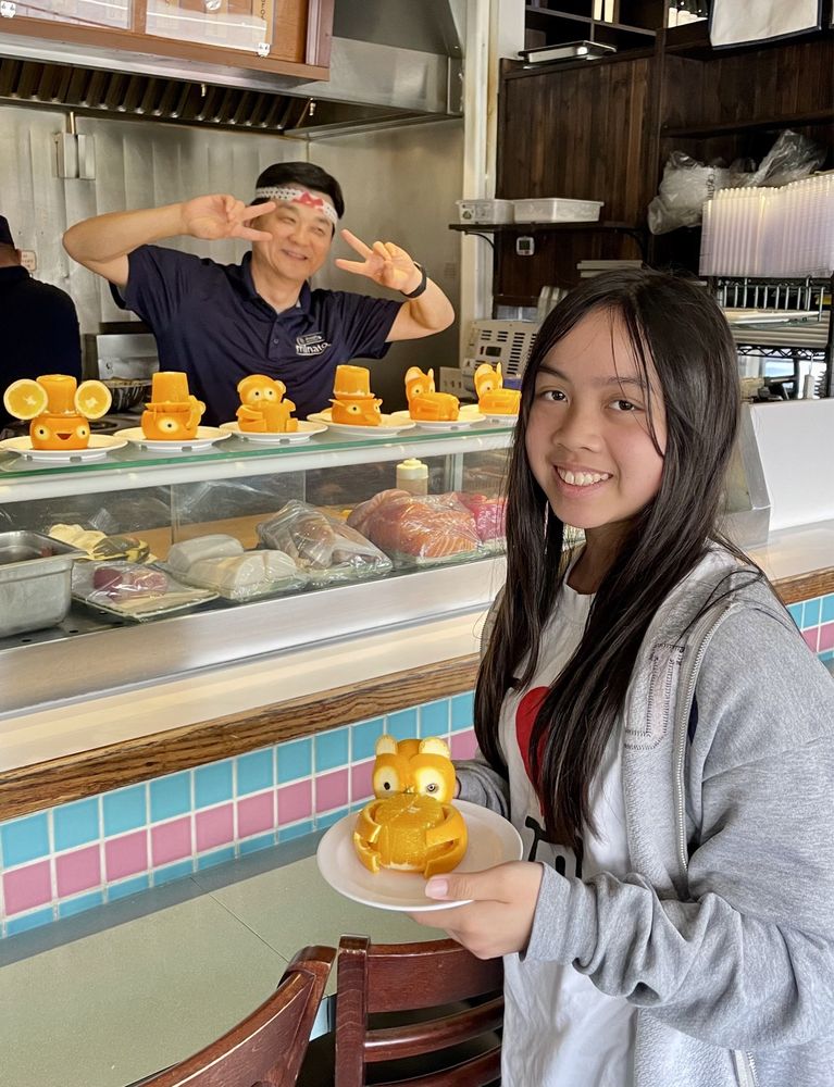 A Minato Sushi regular enjoying a meal at the restaurant