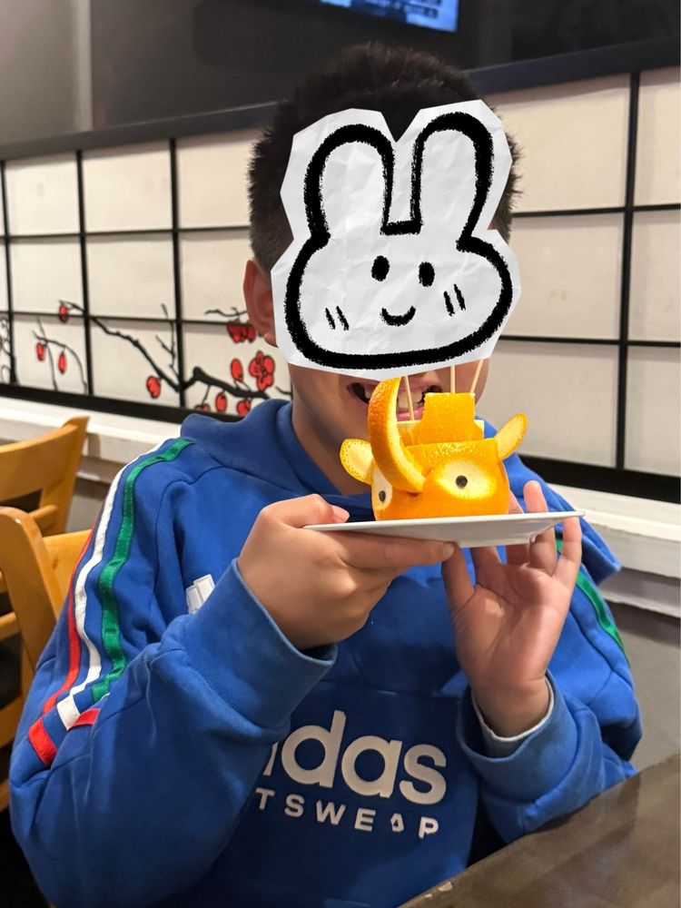 A Minato Sushi regular enjoying a meal at the restaurant